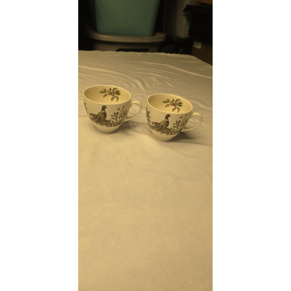 vintage Johnson Brothers teacups from the Game Birds line With a pheasant design